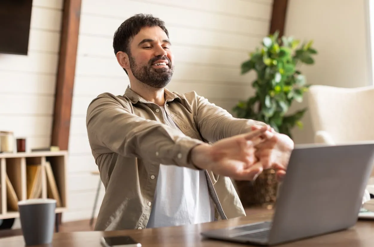 Business owner taking a break at his laptop