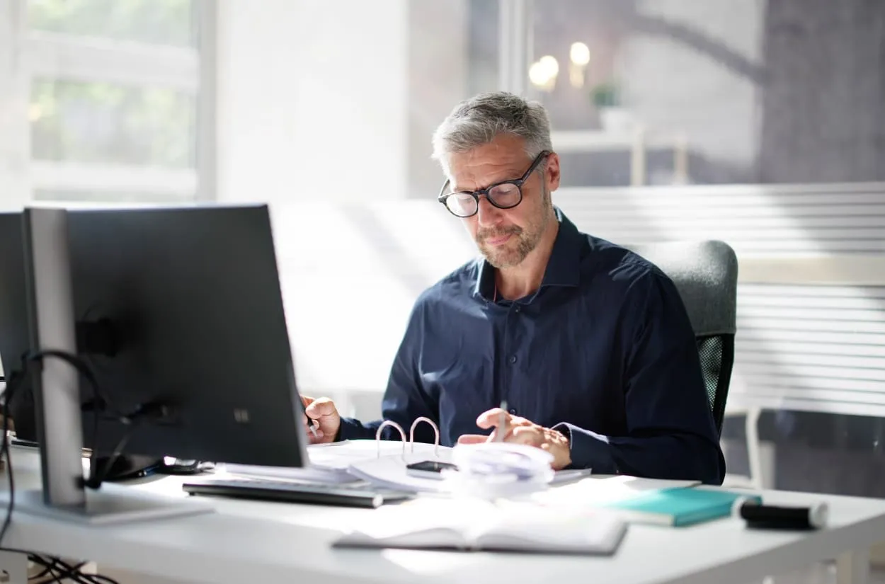 Business owner reviewing a financial plan